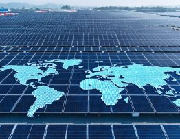 A conceptual illustration showing a solar farm blended with a global map, featuring infographics and symbols that depict international solar policies and their influence on energy markets.