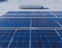 "Modern solar installation with large-scale EV battery storage for energy independence."